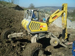 kracejici bagr MENZI MUCK A91 s